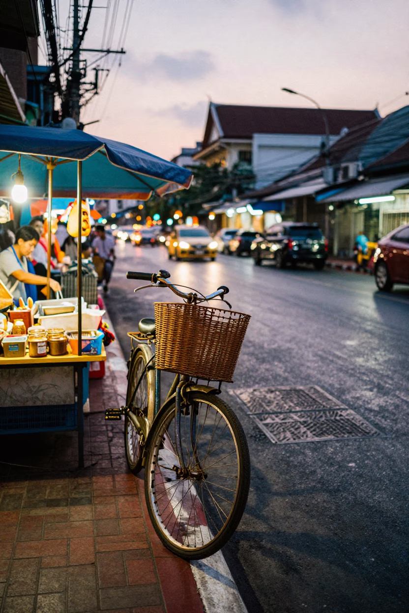 Colorful Early Evening Bangkok Street Scene with Bicycle Basket and Local Activity in in Bangkok, Thailand