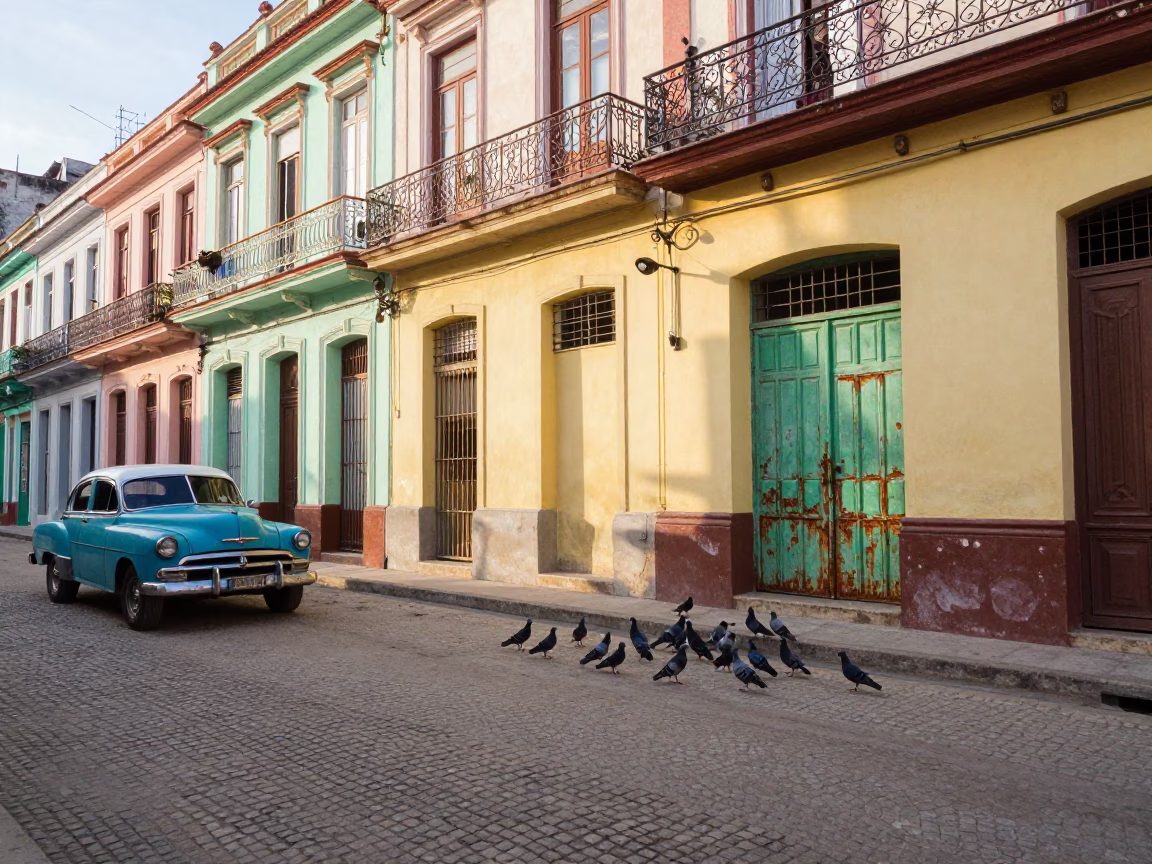 Colorful Havana Street Scene with Pigeons and Vintage Car at Sunrise in in Havana, Cuba