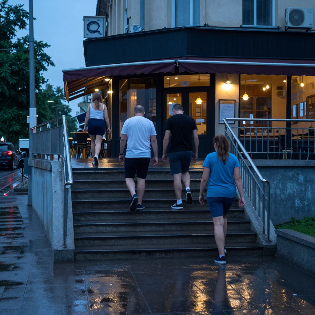 Commuters Ascending Wet Stairs from Underpass in Minsk in outside a corner cafe in Minsk