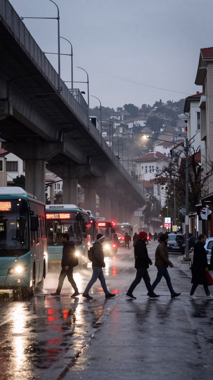 Commuters Cross Under Elevated Train in Dusk in under an elevated train line in Yüksekova district
