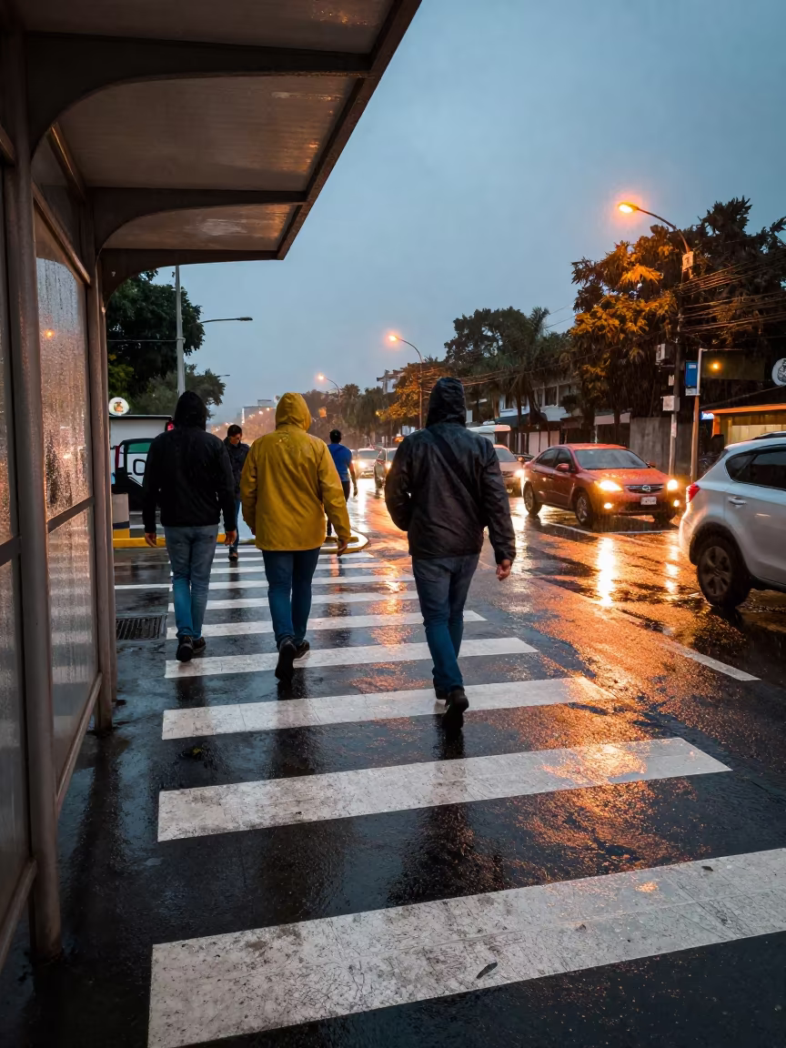 Commuters Cross Stalled Traffic Maracay Monsoon in beside a steamed-up bus shelter in Maracay