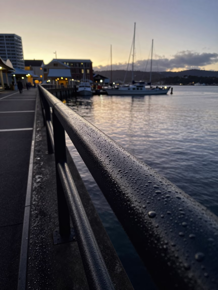 Condensation on Cold Rail at Nautical Dawn in Hobart Tasmania Harbor in in Hobart, Tasmania, Australia