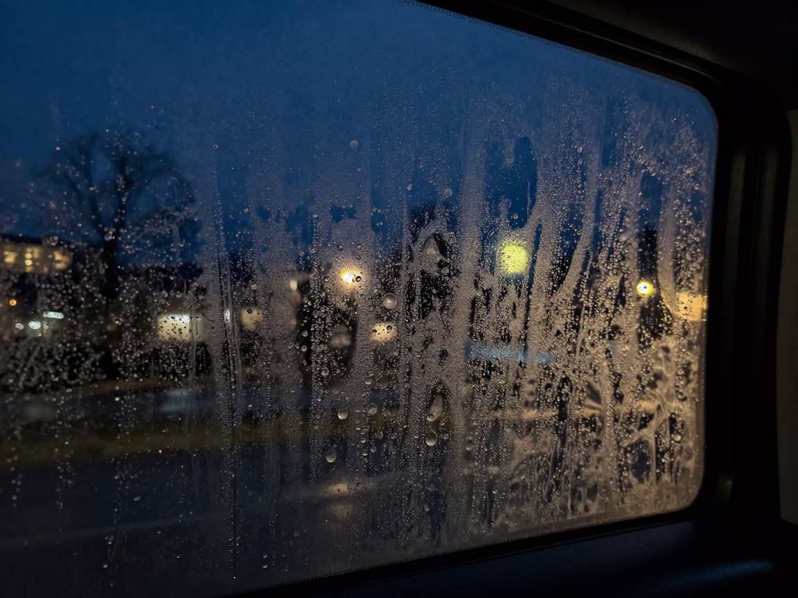 Condensation on Window Glass Framing a Night View of Vancouver's Funicular Climbing Steep Hill in in Vancouver, British Columbia, Canada