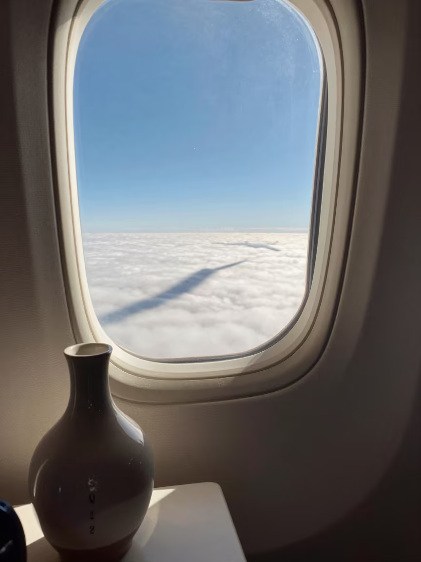 Contrail Shadow on Clouds at New Borg El Arab in on a bedside table near New Borg El Arab