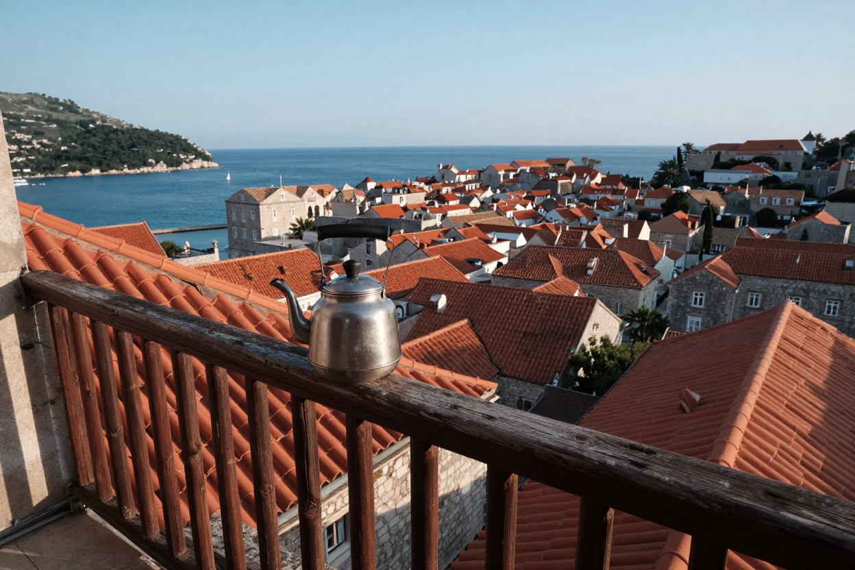Cool Morning Light on Dubrovnik Balcony with Tea Kettle and Flowerpot in in Dubrovnik, Croatia