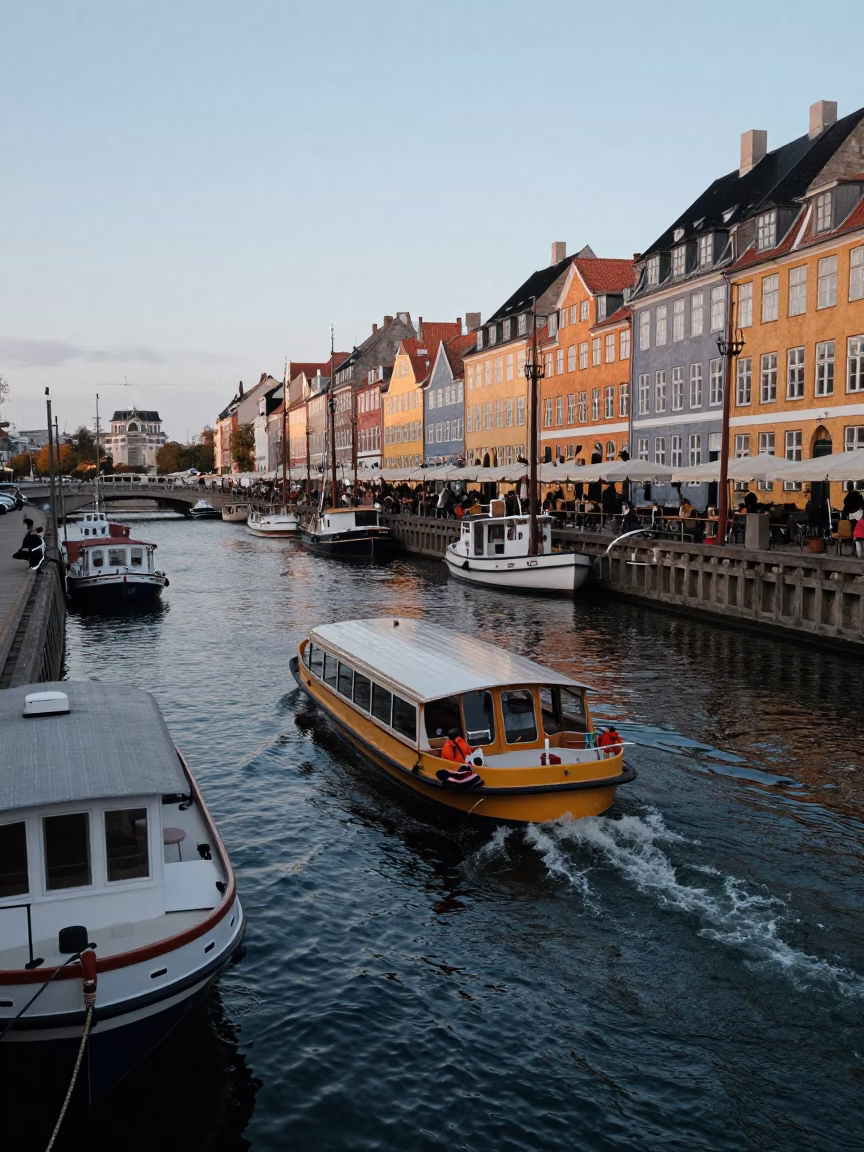 Copenhagen Blue Hour Canal Scene with Water Taxi and Houseboats in in Copenhagen, Denmark