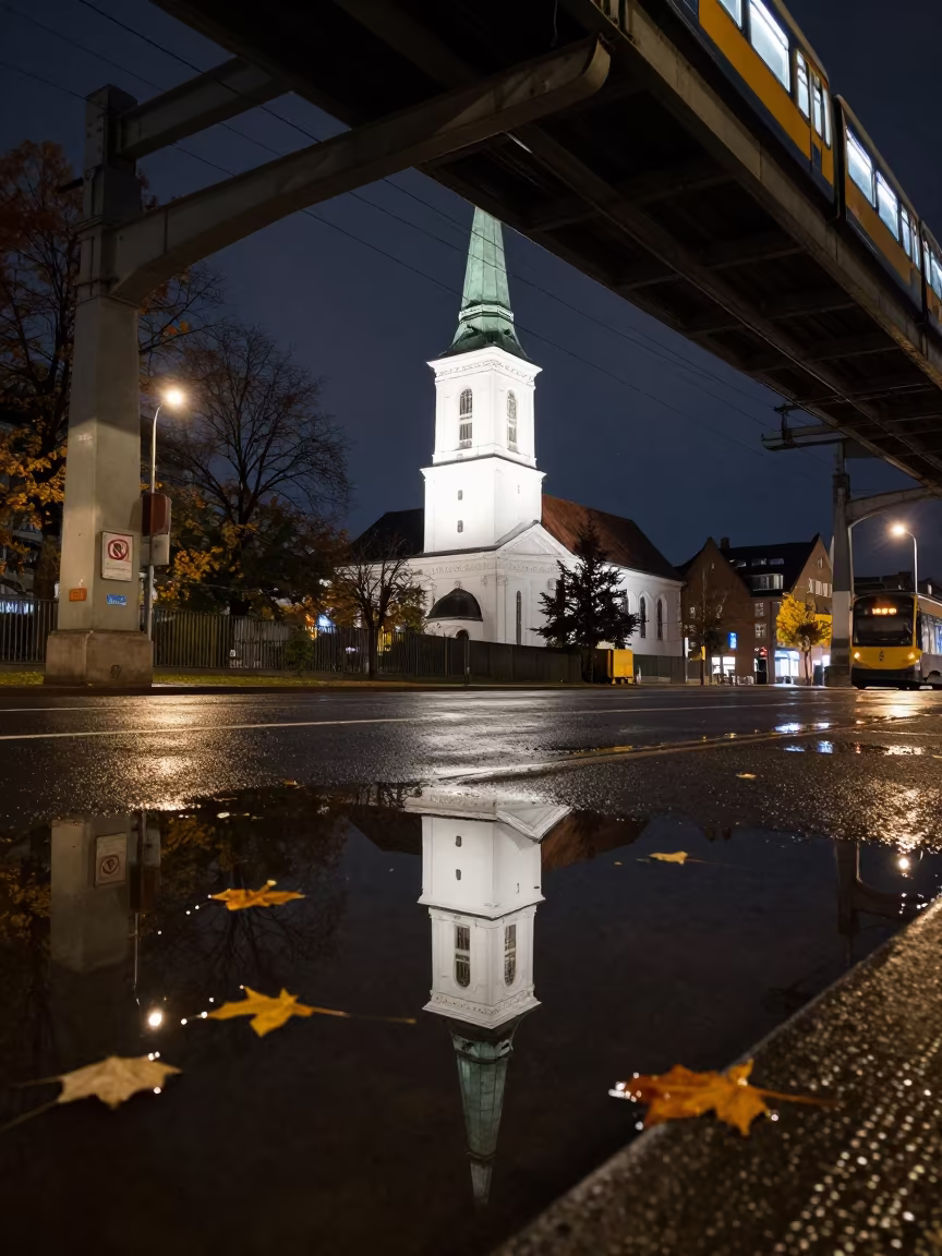 Copenhagen Church Steeple Reflection Rain in under an elevated train line in Copenhagen