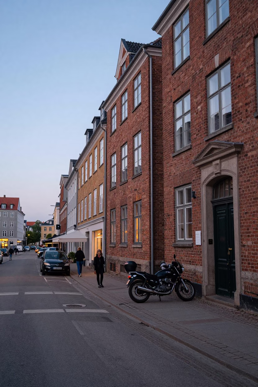 Copenhagen Denmark Early Evening Street Scene with Motorcycle and Boot Scraper in in Copenhagen, Denmark