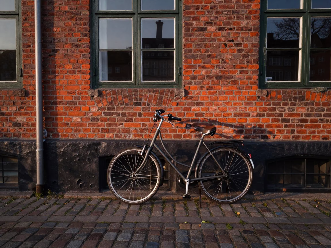 Copenhagen Denmark Nautical Dawn Bicycle Parked Near Brick Bakery Window Display in in Copenhagen, Denmark
