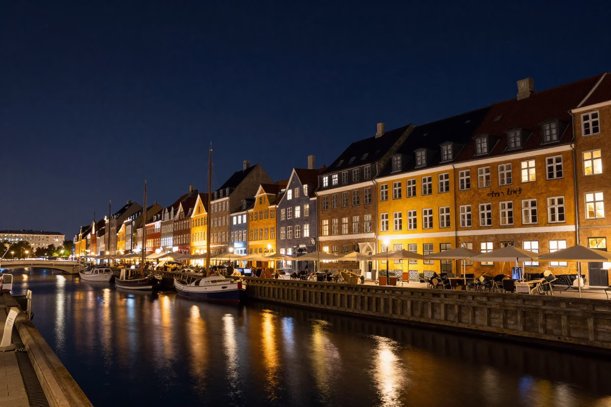 Copenhagen Denmark Night Sky Over Historic Nyhavn Canals and Historic Buildings in in Copenhagen, Denmark