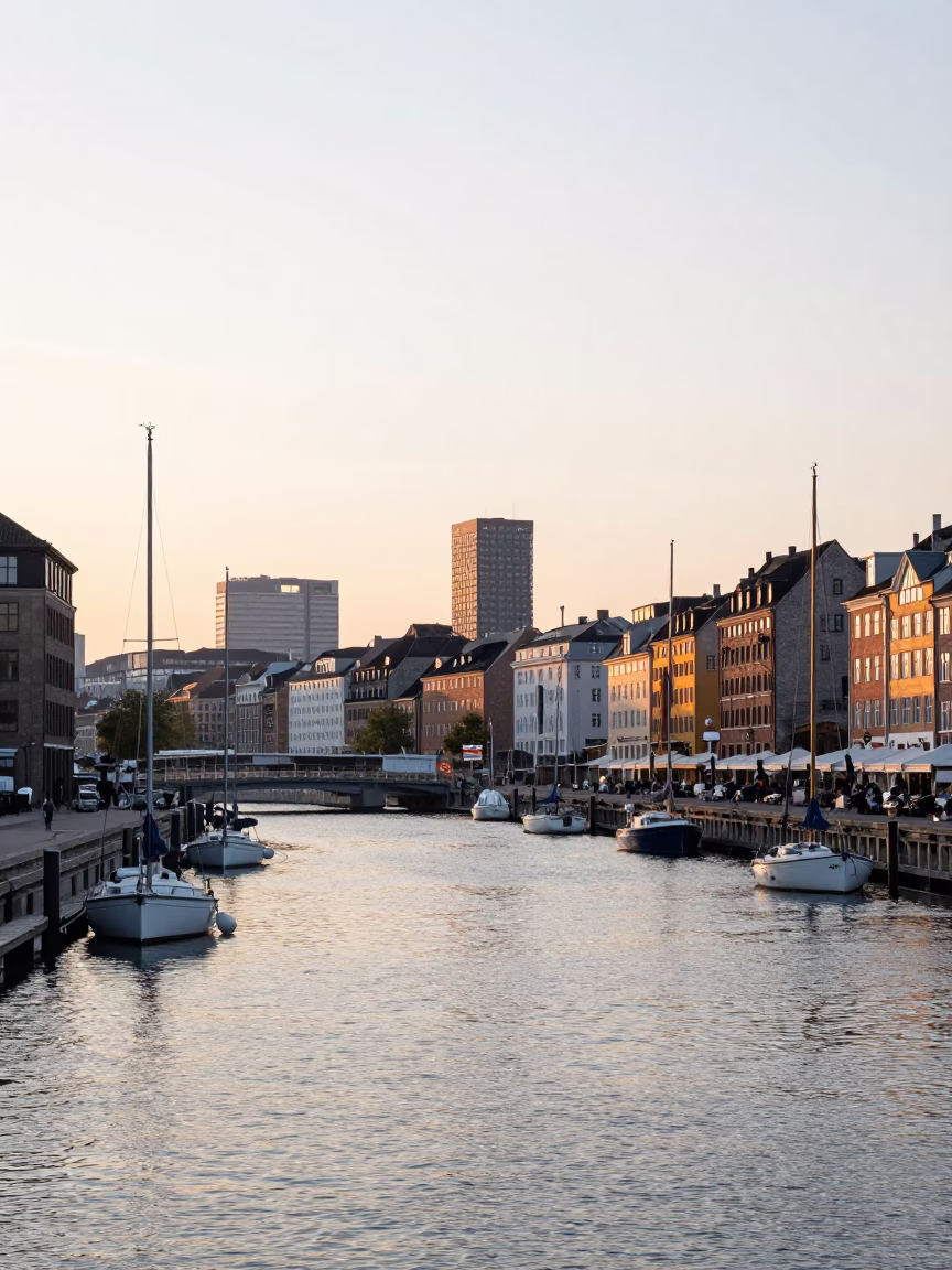 Copenhagen Denmark Sunrise Harbor View with Sailboats and Urban Skyline at Dawn in in Copenhagen, Denmark