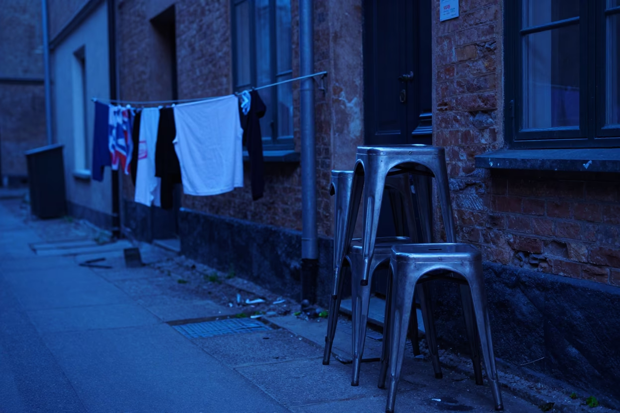 Copenhagen Evening Blue Light with Metal Stools and Clothesline in in Copenhagen, Denmark
