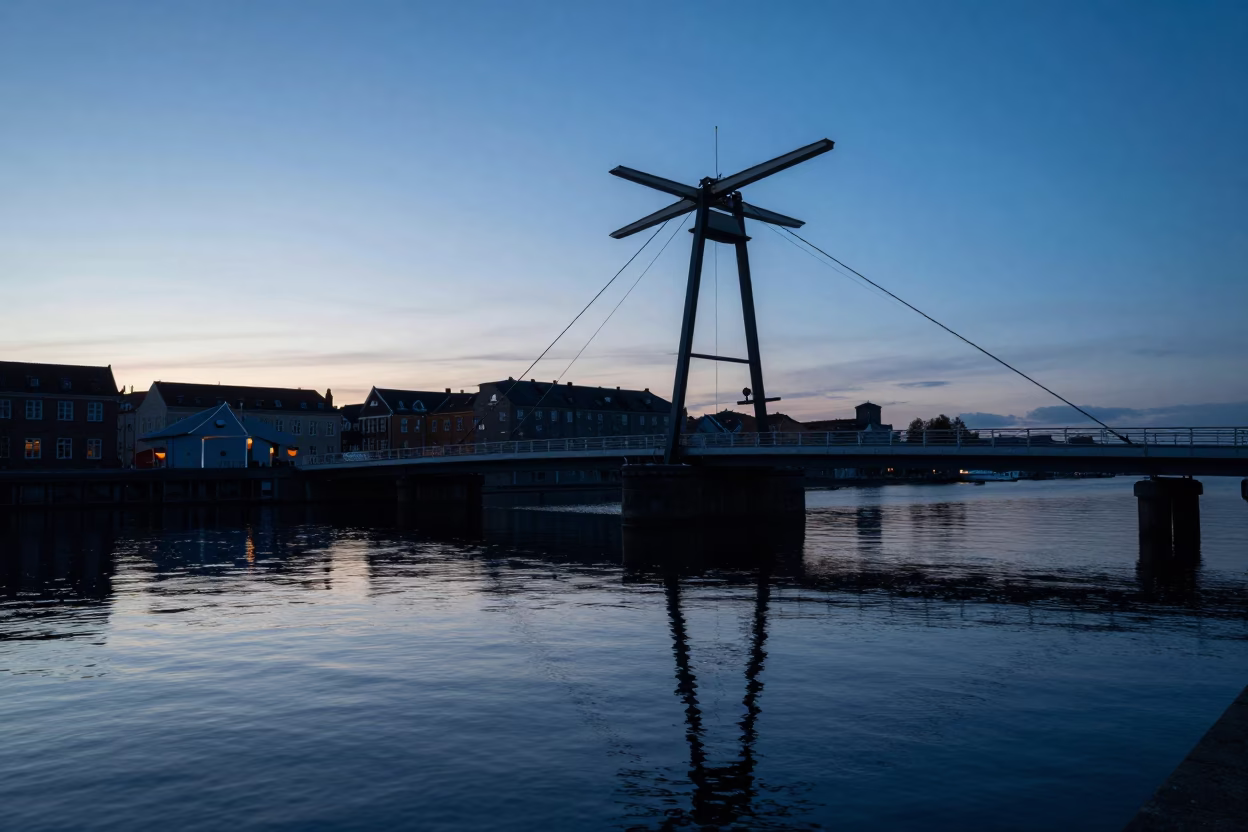 Copenhagen Harbor Dawn Reflections of Drawbridge Counterweight Tower and Oil Slick Water in in Copenhagen, Denmark
