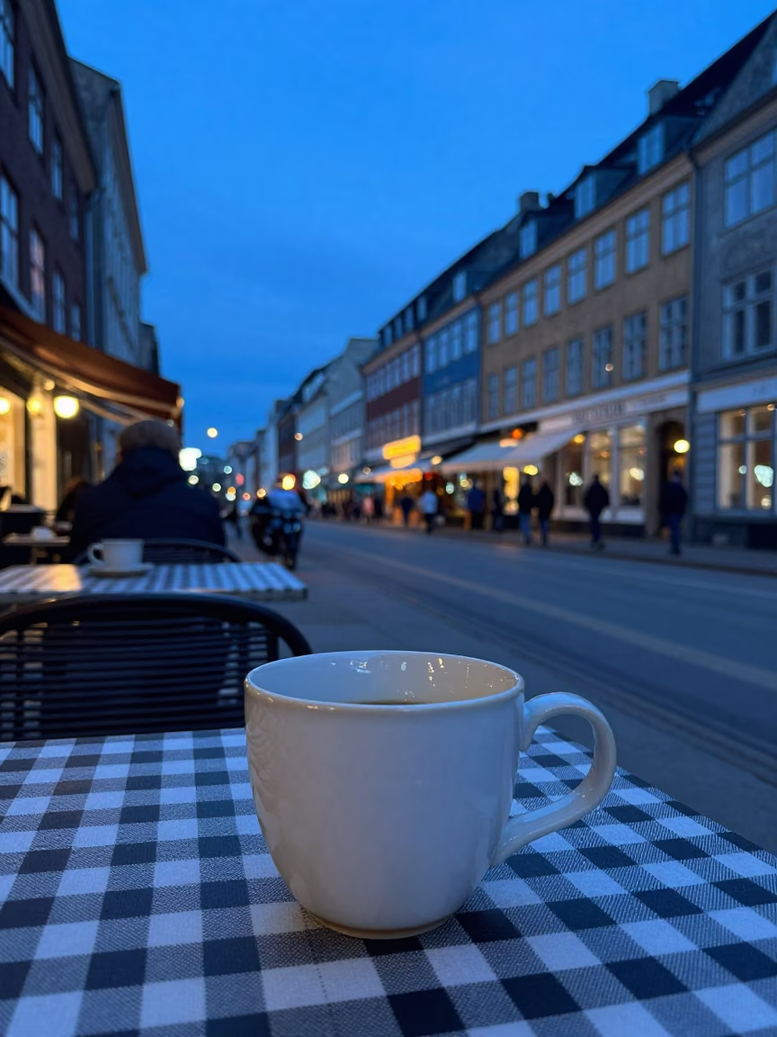 Copenhagen Indigo Twilight Street Scene with Ceramic Cup and Tablecloth in in Copenhagen, Denmark
