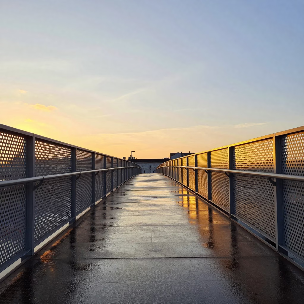 Copenhagen Sunset Pedestrian Overpass Perforated Metal and Wet Footsteps in in Copenhagen, Denmark
