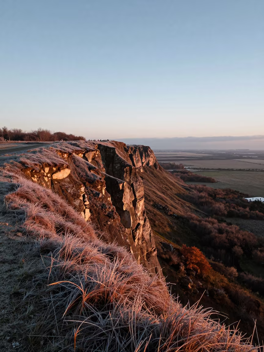 Copper Autumn Cliffline Under Changing Weather in across a floodplain after rain near Adana