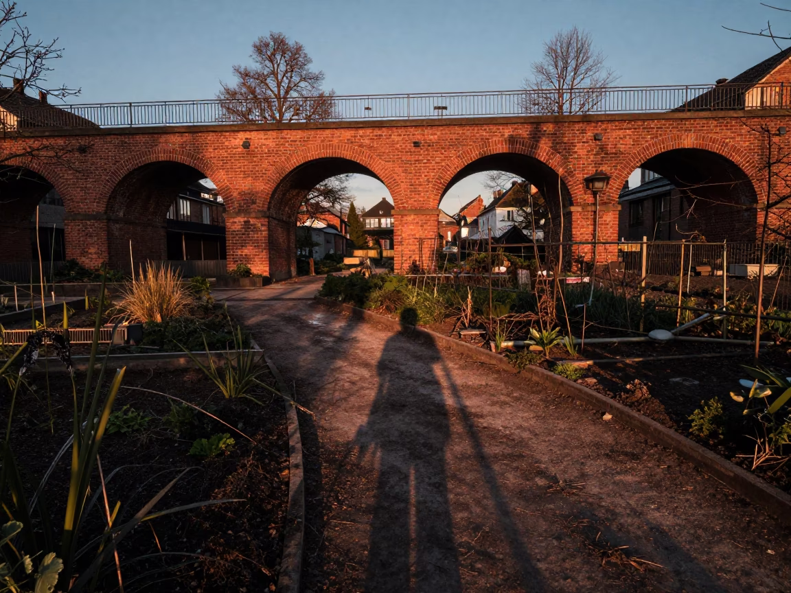 Copper Dusk Viaduct Shadow Over Copenhagen Allotment Gardens and Lockbox in in Copenhagen, Denmark
