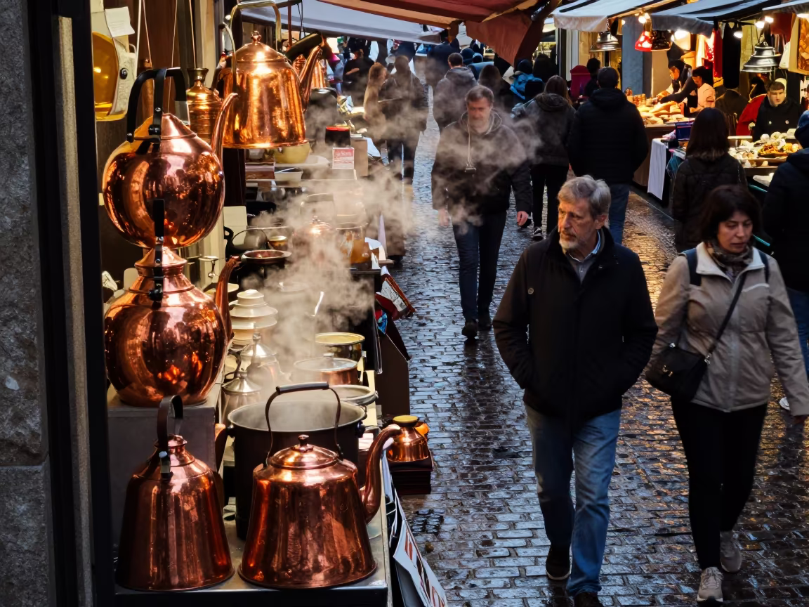 Copper Kettle Stall Reflecting Passersby in Madrid Market in in a flea market lane in Sol, Madrid