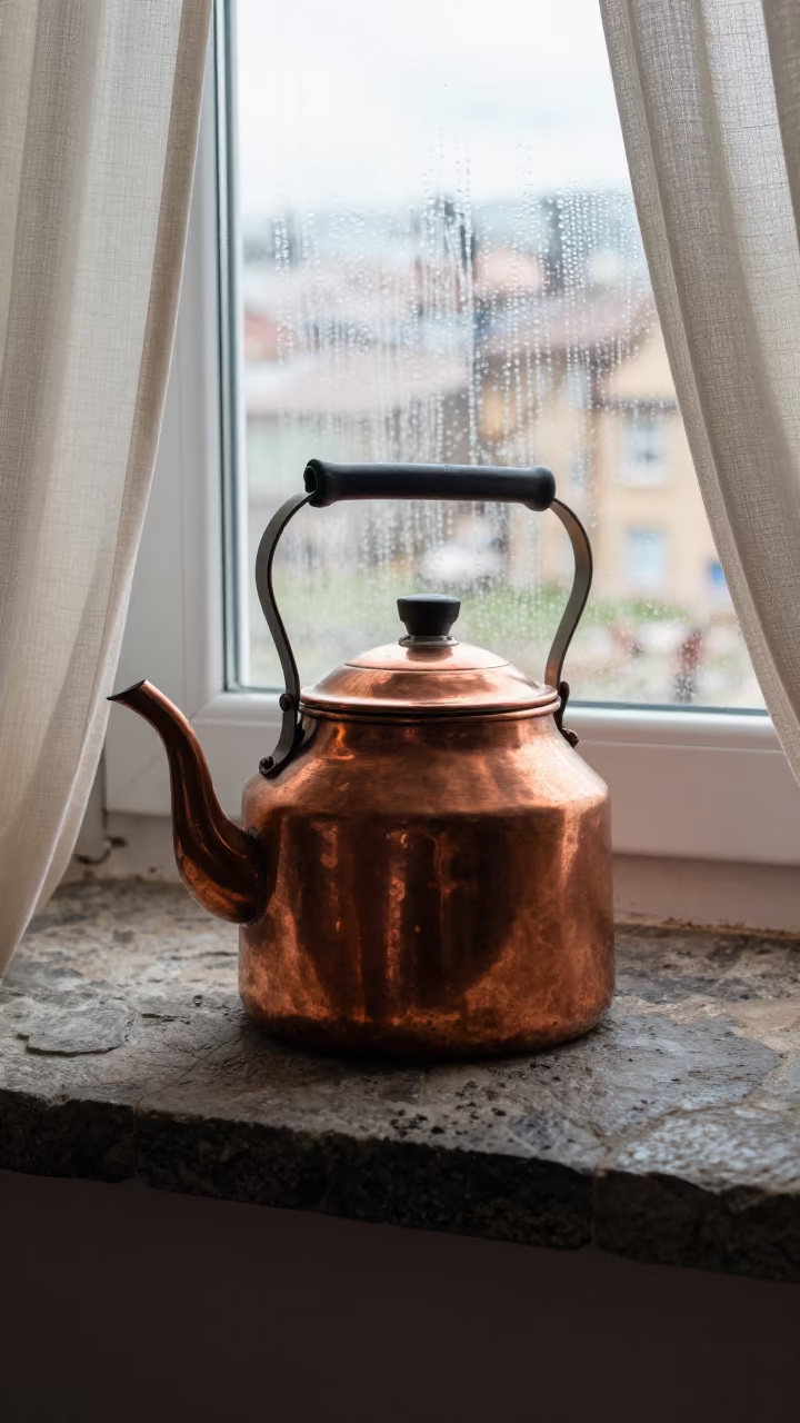 Copper Kettle on Stone Hearth Window Seat in on a window seat in Erzurum