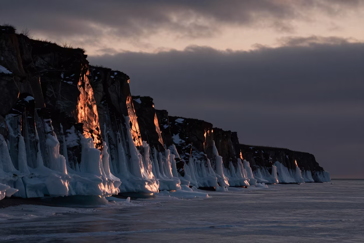 Copper Light on Permafrost Cliff Ice Wedges in along a wave-cut shoreline in Russia