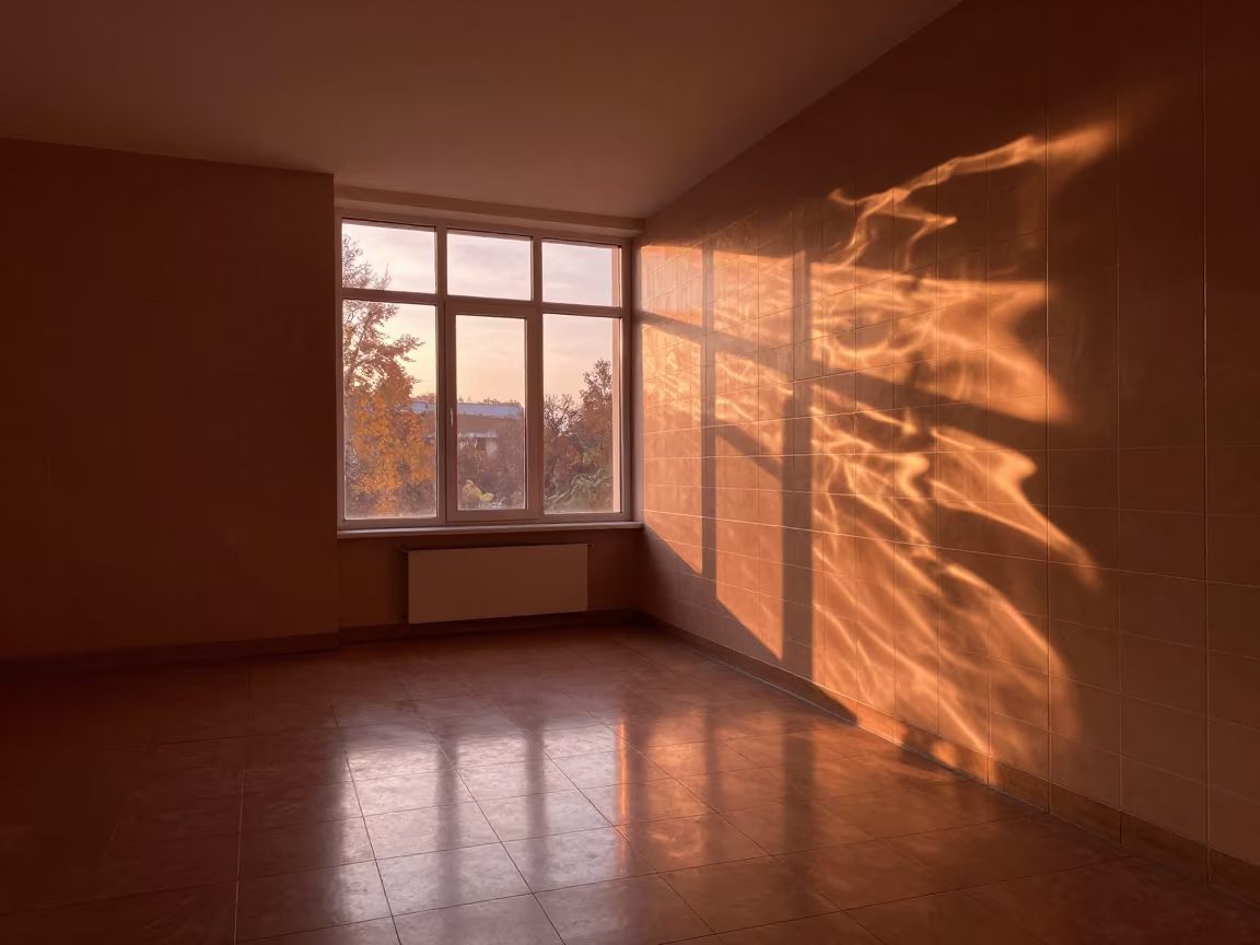 Copper Light Ripples on Tiled Wall in Szeged in inside a skylit passageway in Szeged