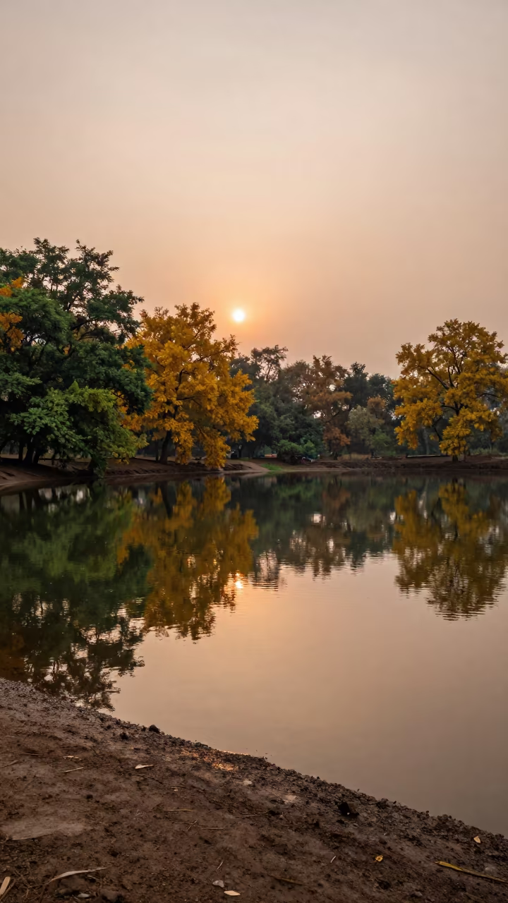 Copper Oxbow Lake Reflecting Late Summer Trees in near Karachi