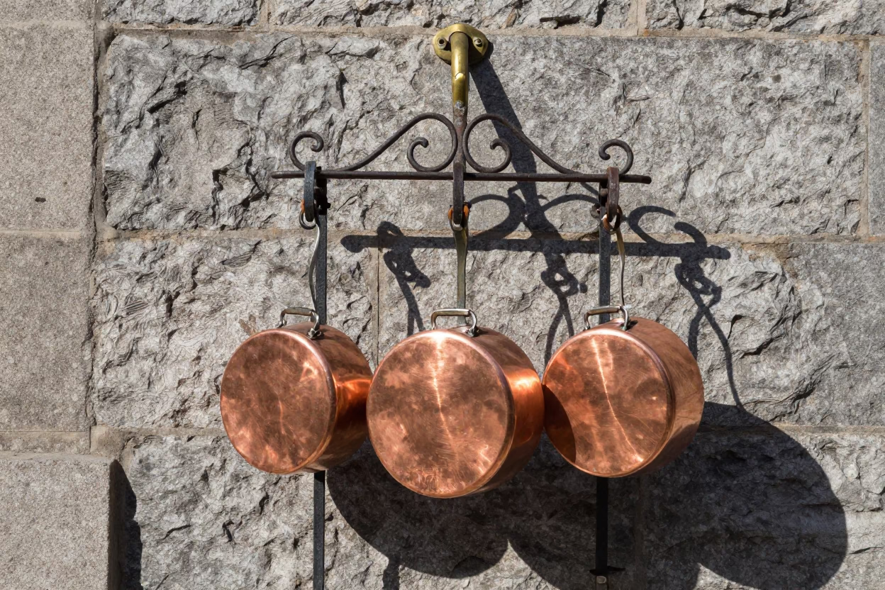 Copper Pots Catching Light in Quebec City in in Quebec City, Canada