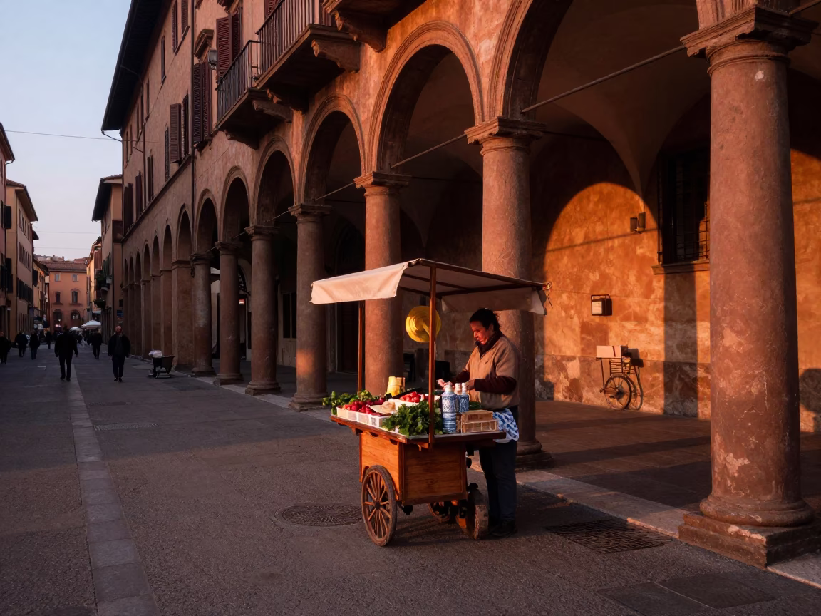 Copper-toned dusk light on Bologna street corner with porcelain jar and stair rail in in Bologna, Italy