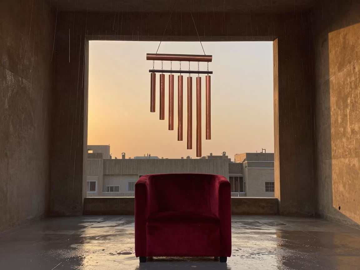 Copper Wind Chime and Upward Rain Near Cairo in on a velvet chair near Cairo