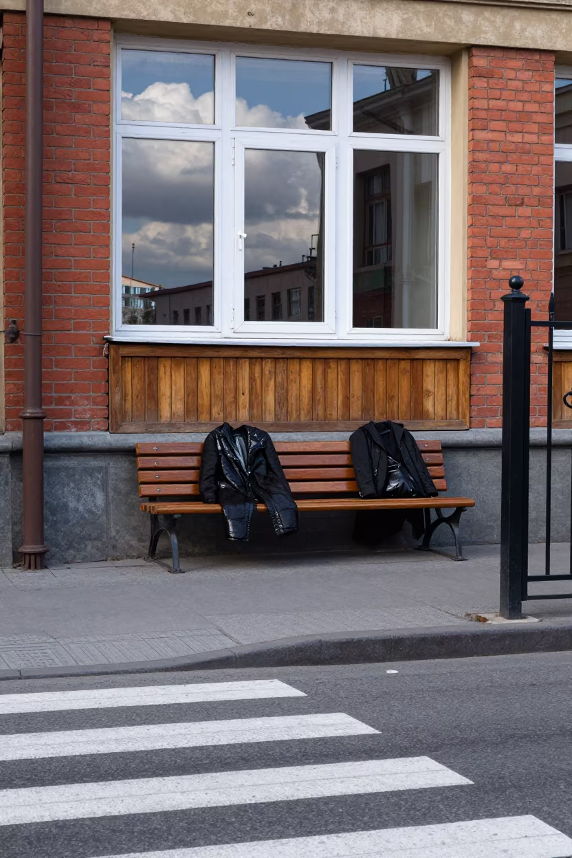 Courthouse Bench Under Damp Wool Coats in at a crosswalk by a school gate near Yerevan