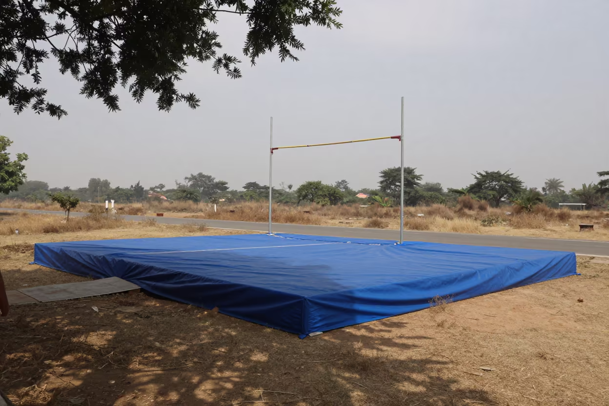 Covered Pole Vault Pit in Dappled Delhi Light in at a roadside stop near Mehrauli, Delhi