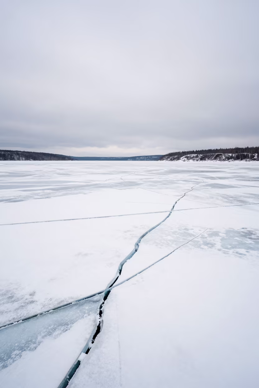 Cracked Ice Surface on Frozen Canadian Lake in in Canada