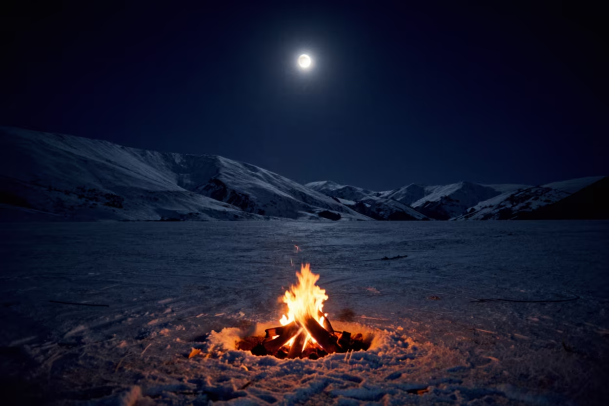 Crescent Moon Over Snowfields After Power Outage in beneath a hard winter sky over snowfields in New Zealand