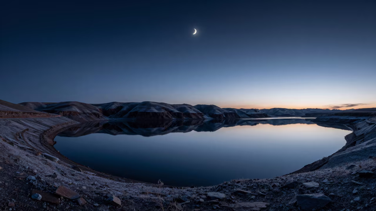Crescent Moon Reflected in Punjab Fjord Twilight in from a frost-hushed ridgeline in Punjab