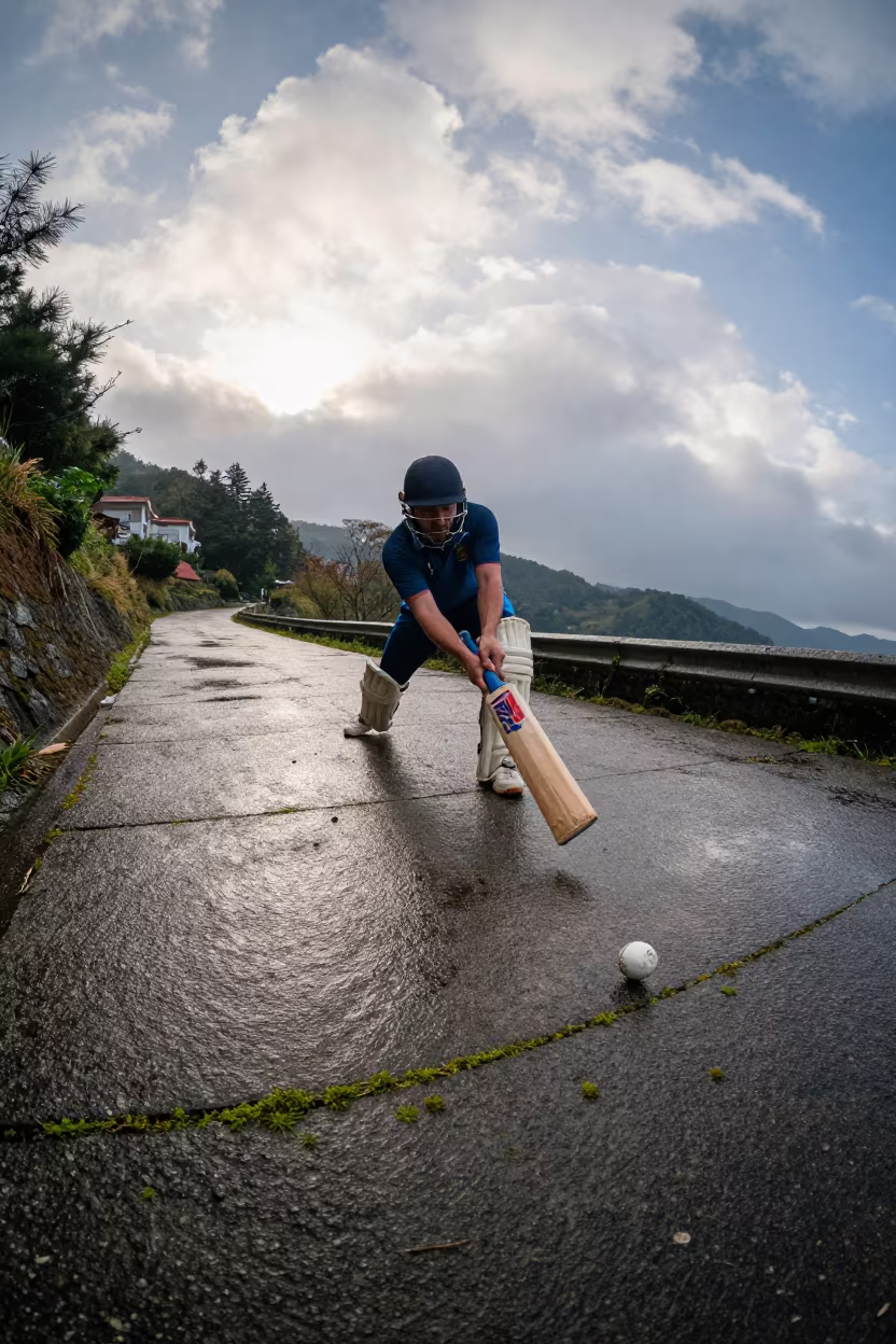 Cricket Batsman Pulls Ball on Winter Mountain Path in on a mountain path near Keelung