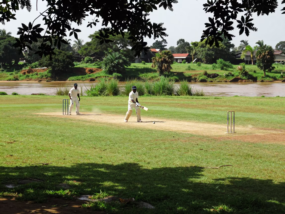 Cricket Batsman Pulls Short Ball Near Riverbank in by a riverbank near Banfora