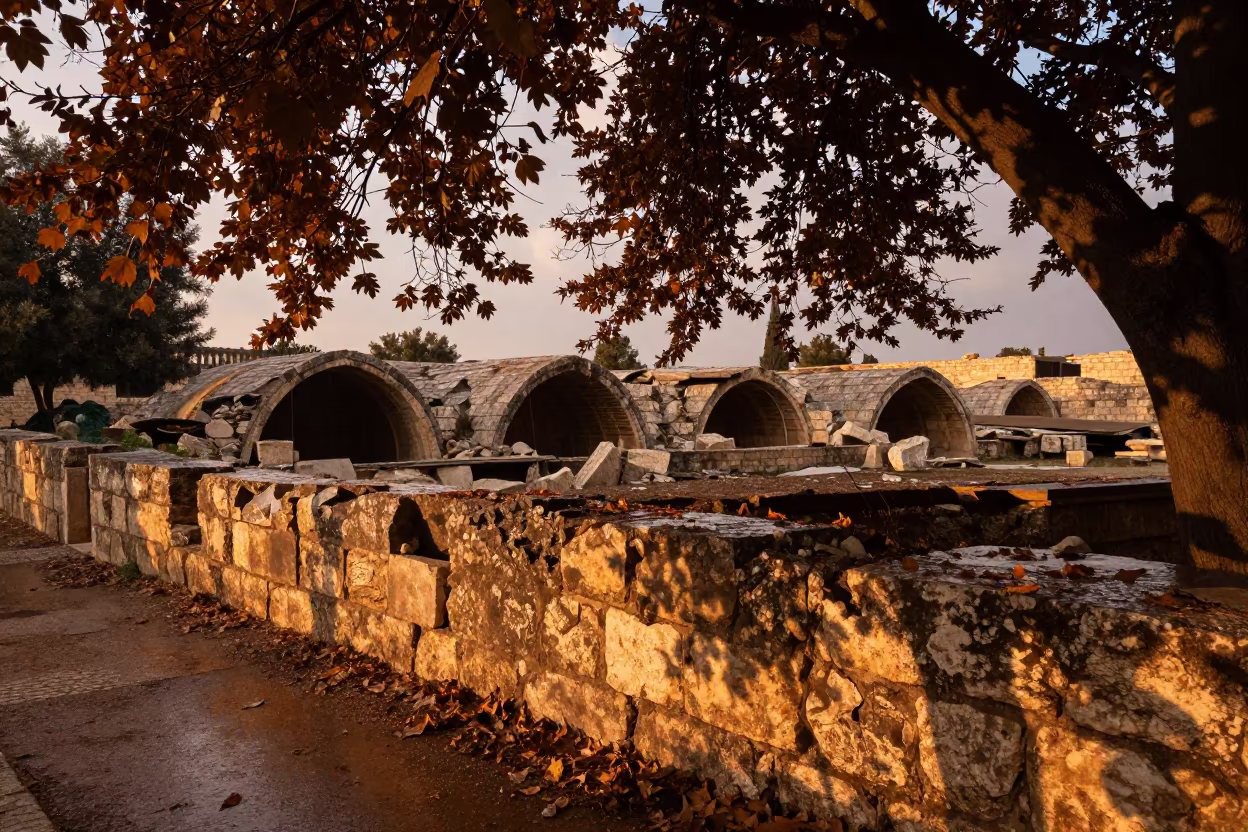 Crumbling Cistern Edge in Late Autumn Light in among roofless stone chambers in Israel