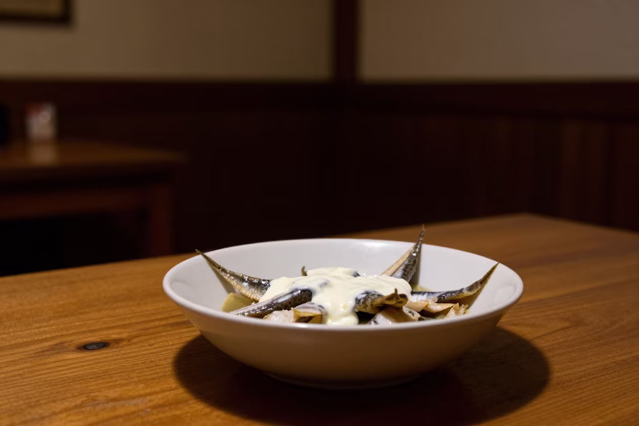 Cullen Skink Bowl with Cream at Night in at a roadside diner table in Béchar