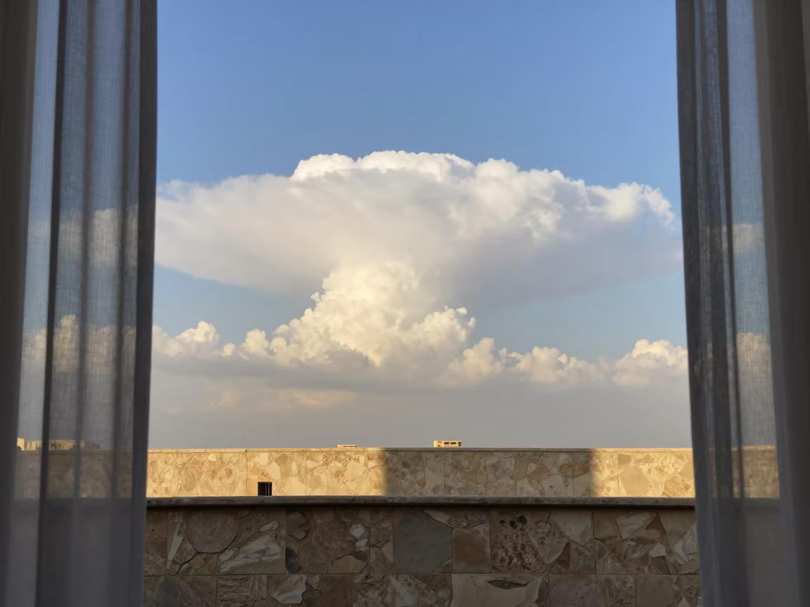 Cumulonimbus Anvil Cloud Over Mansoura Ledge in on a stone ledge near Mansoura