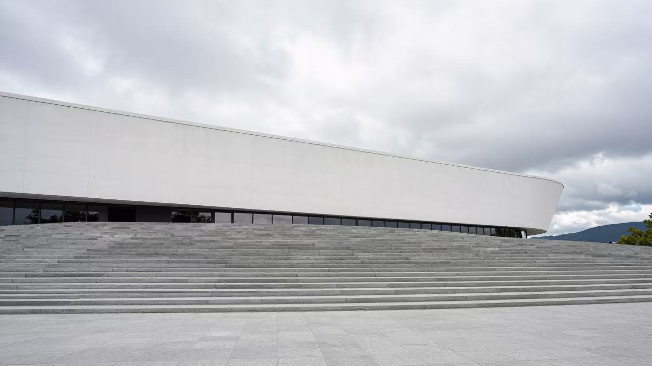 Curved Museum Facade Norway Staircase in at the base of a monumental staircase in Norway