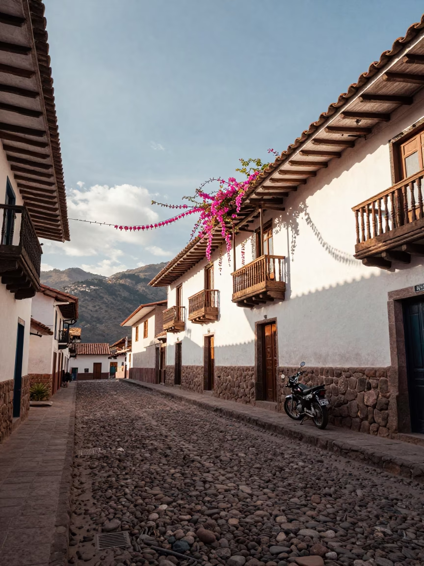 Cusco Peru Early Afternoon Street Scene With Bleeding Heart Vine and Motorcycle in in Cusco, Peru