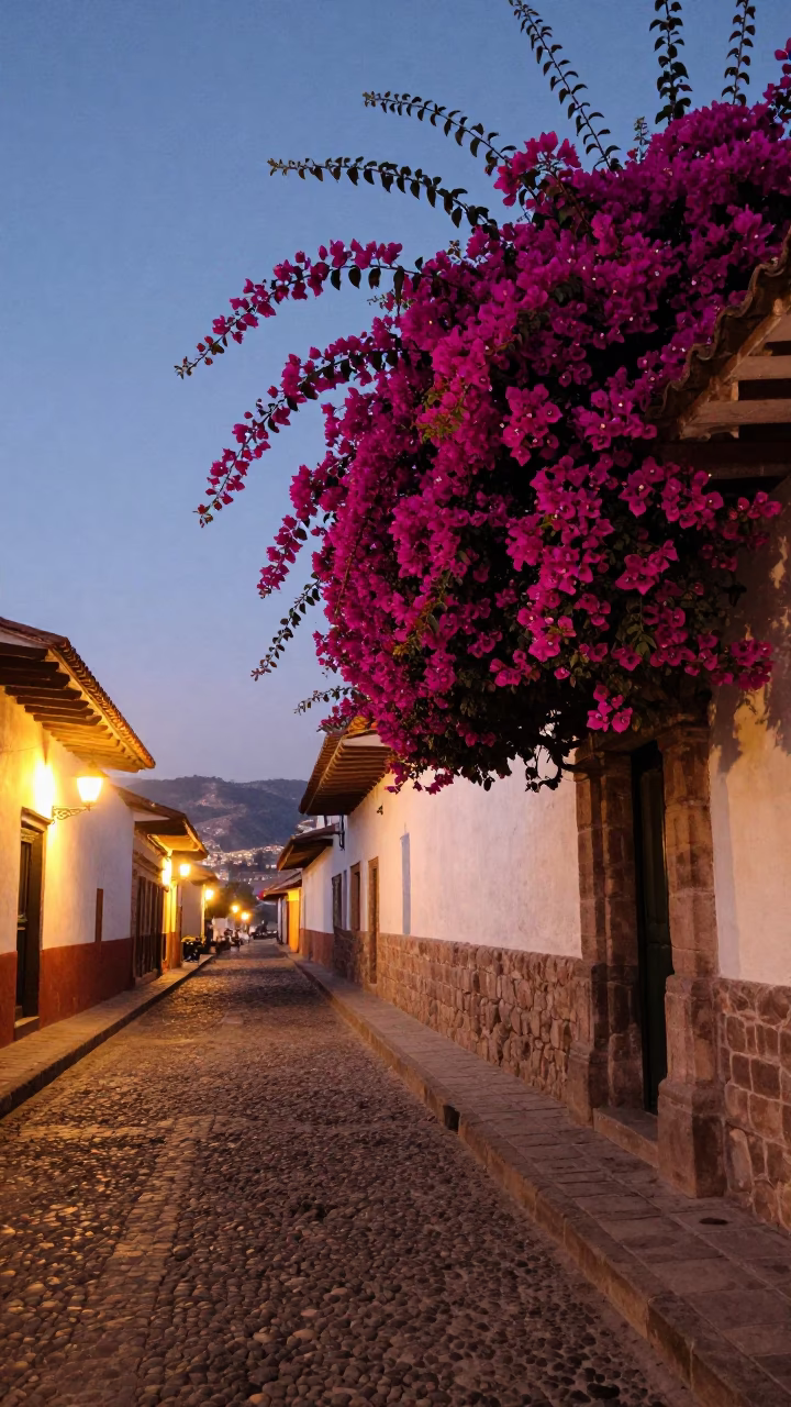 Cusco Peru Evening Street Scene with Bougainvillea and Cobblestone Plaza in in Cusco, Peru