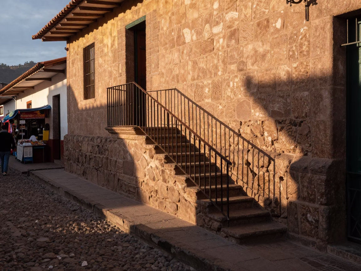 Cusco Peru Golden Hour Street Scene with Stair Rail and Local Market Activity in in Cusco, Peru