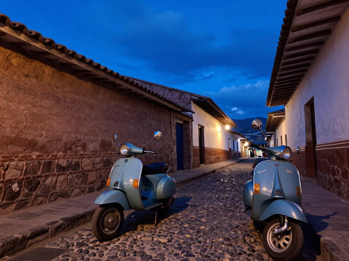 Cusco Peru Indigo Twilight Street Scene with Vintage Vespa and Cobblestone Lane in in Cusco, Peru