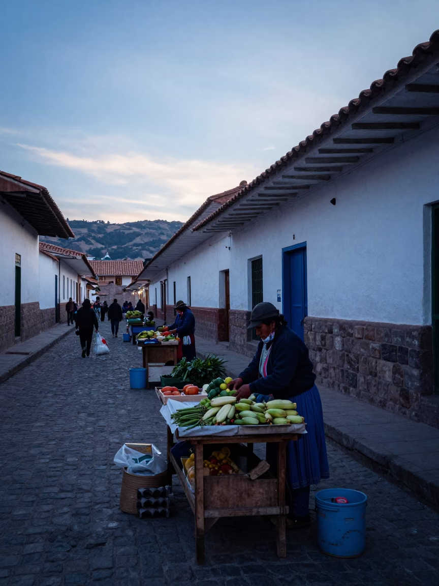 Cusco Peru Pre-Dawn Street Scene with Traditional Market Stalls and Colonial Architecture in in Cusco, Peru