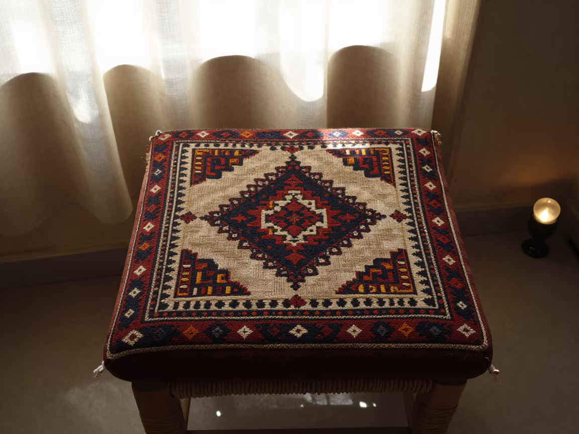 Cushion Cover on Woven Stool in Museum in on a museum plinth in Desouk