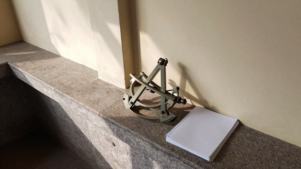 Cut-Glass Sextant on Stone Ledge Kaohsiung in on a painted display ledge near Kaohsiung