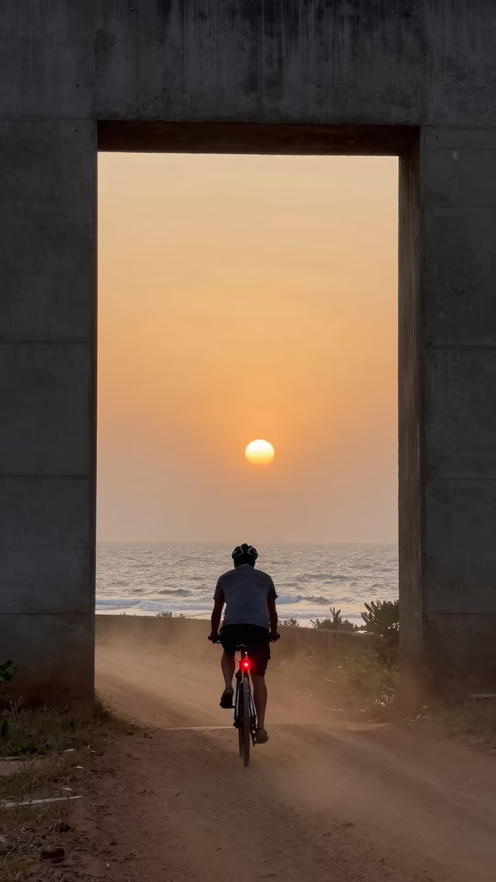 Cyclist Light Trail Opens Ocean Doorway in Fog in at a roadside stop near Malakal