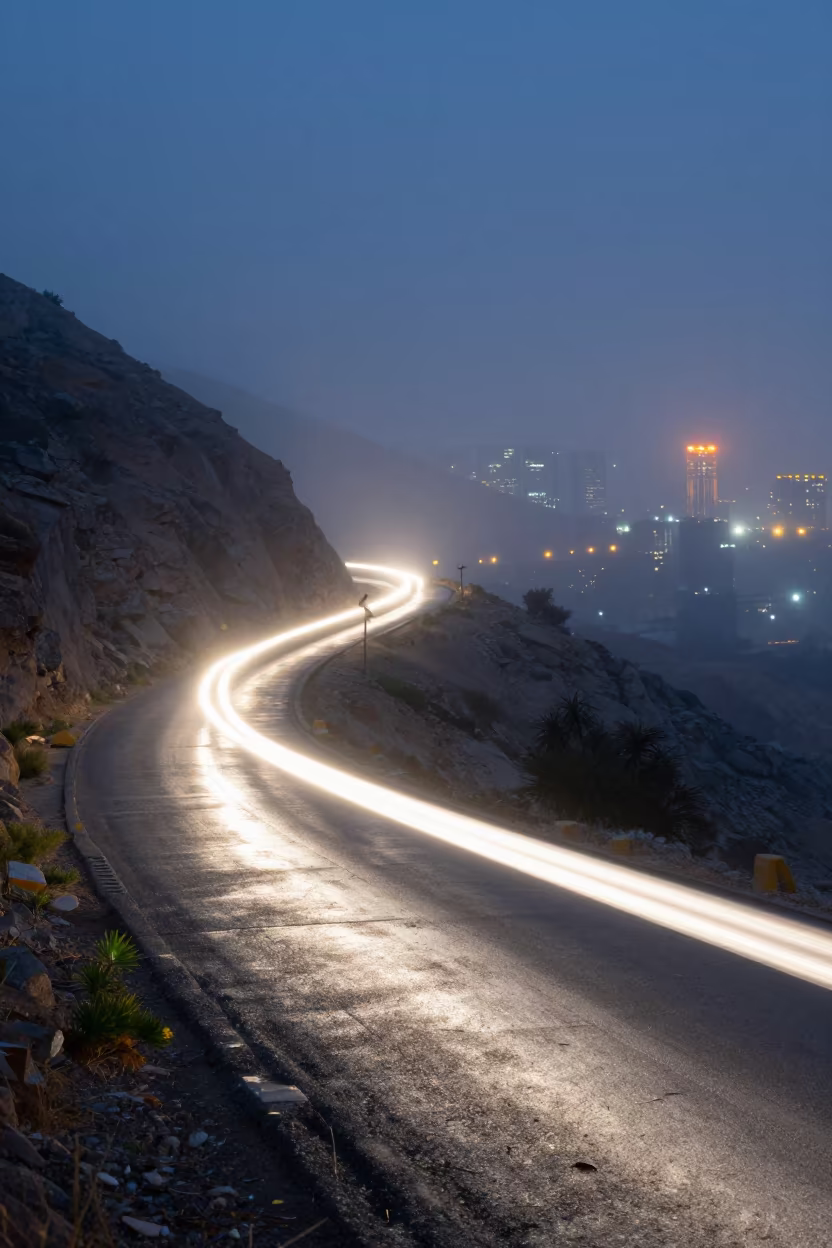 Cyclist Light Trail on Riyadh Mountain Path in on a mountain path near Riyadh