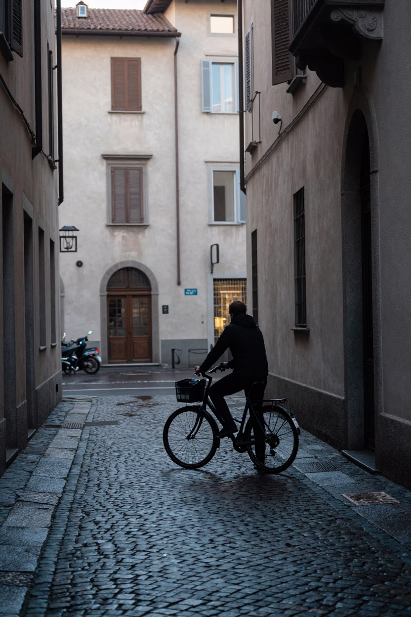 Cyclist Pausing in Milan in in Milan, Italy